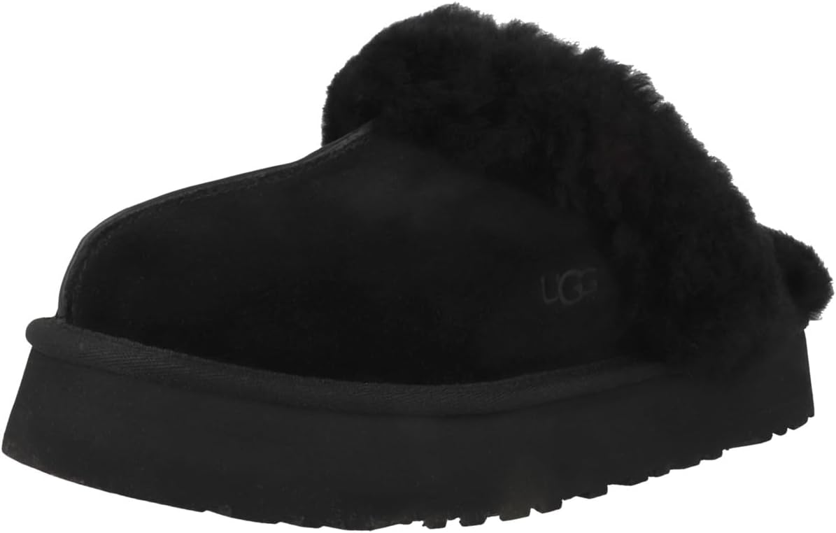 Elevate your loungewear with these UGG slippers featuring a platform sole, plush sheepskin lining, and a unique retro-style design.