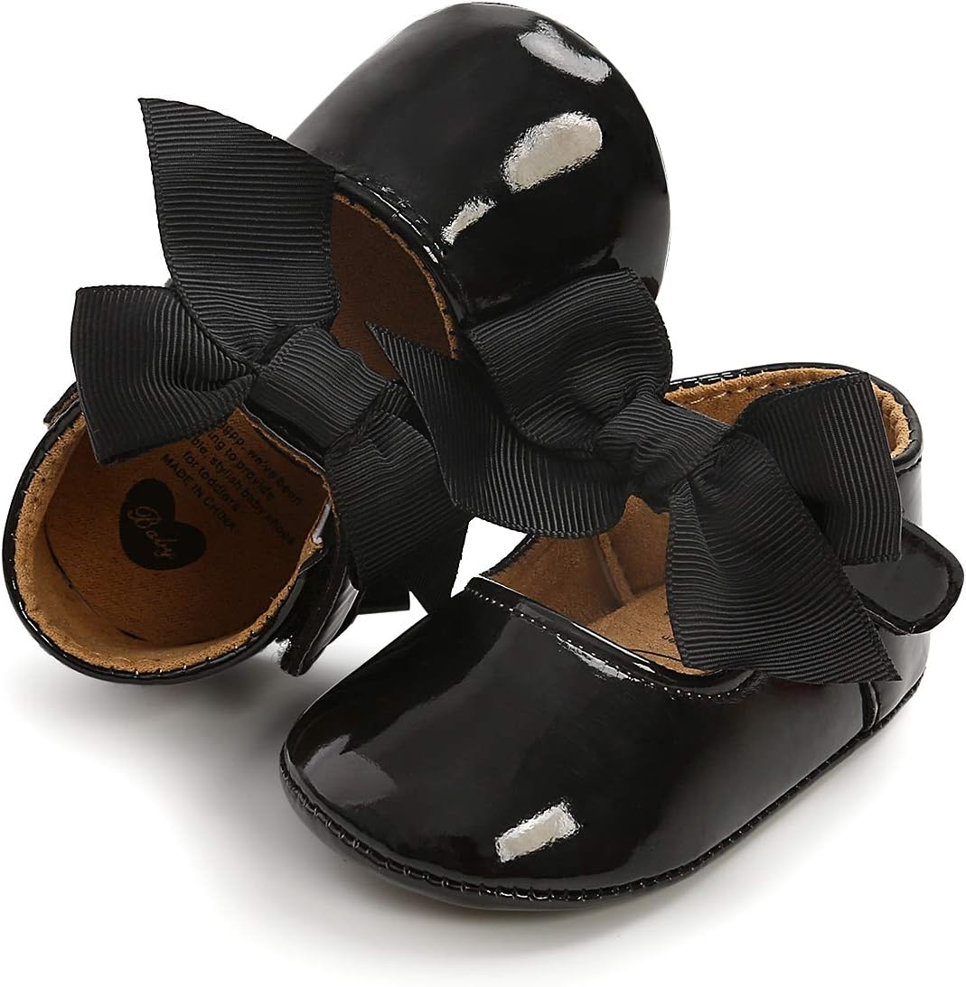 These adorable baby girl shoes are super soft and comfortable, with an adjustable closure to stay on little feet. Perfect for any occasion.