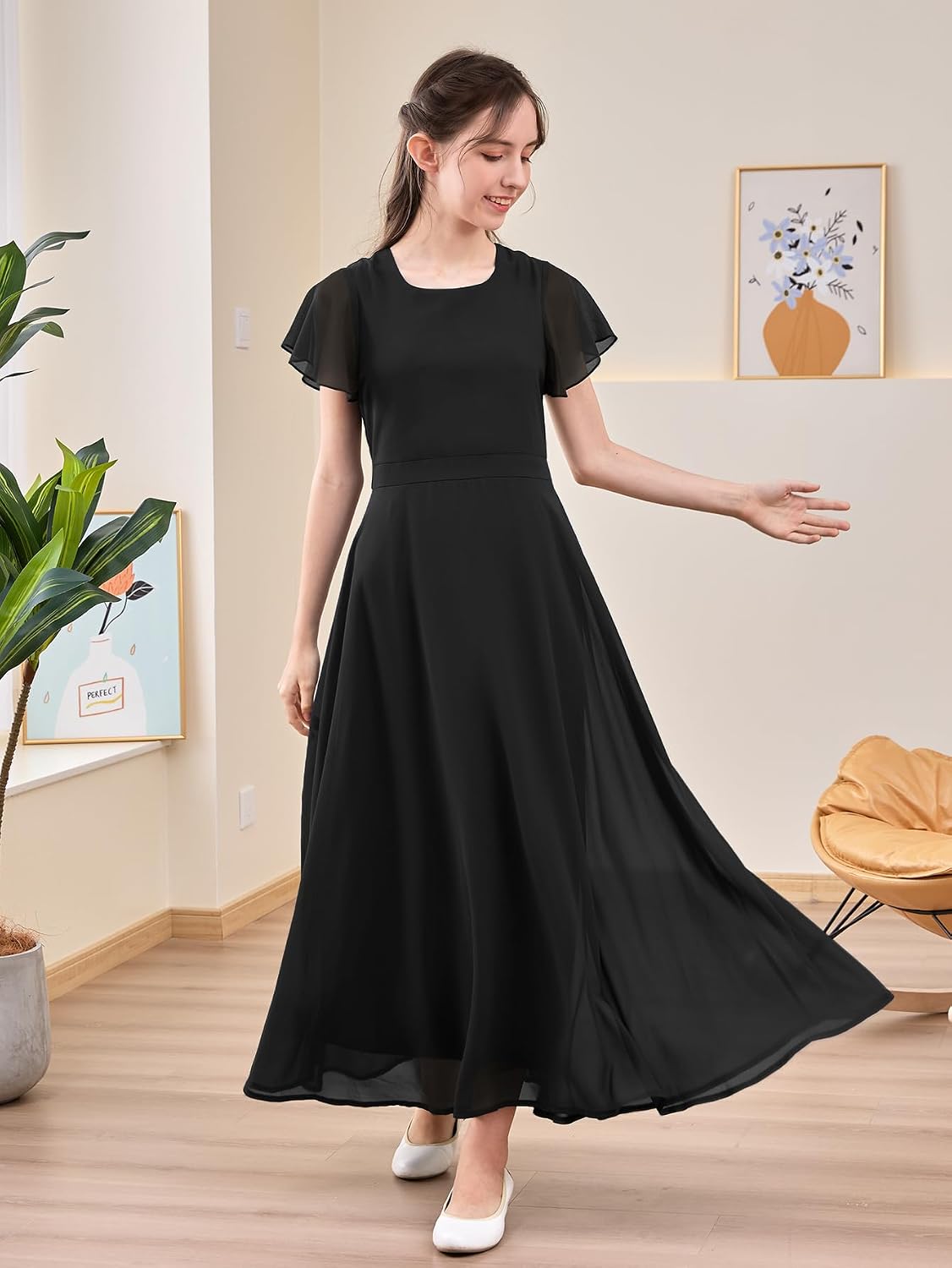 Soft, breathable polyester dress with A-line silhouette and ruffle sleeves, perfect for formal occasions.