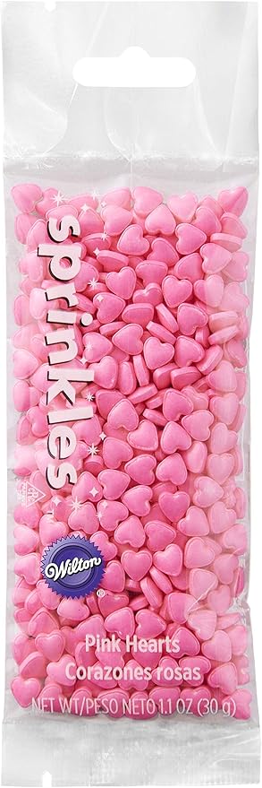 Pink heart-shaped granules