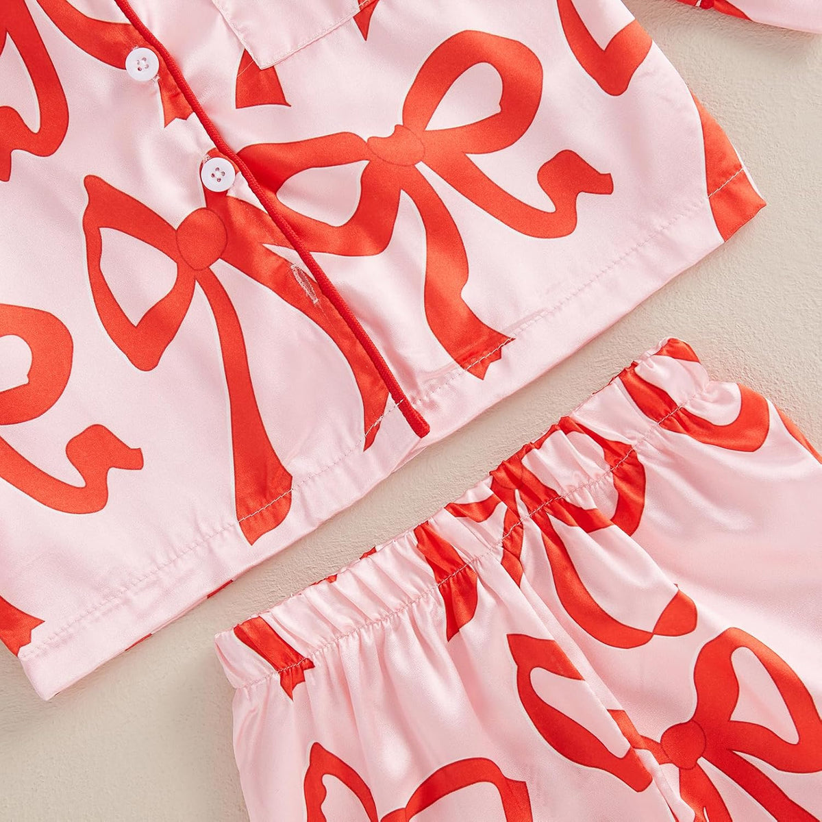 High-quality satin pajama set with Santa Claus and holiday print, soft, breathable fabric, and comfortable fit for cozy winter nights.