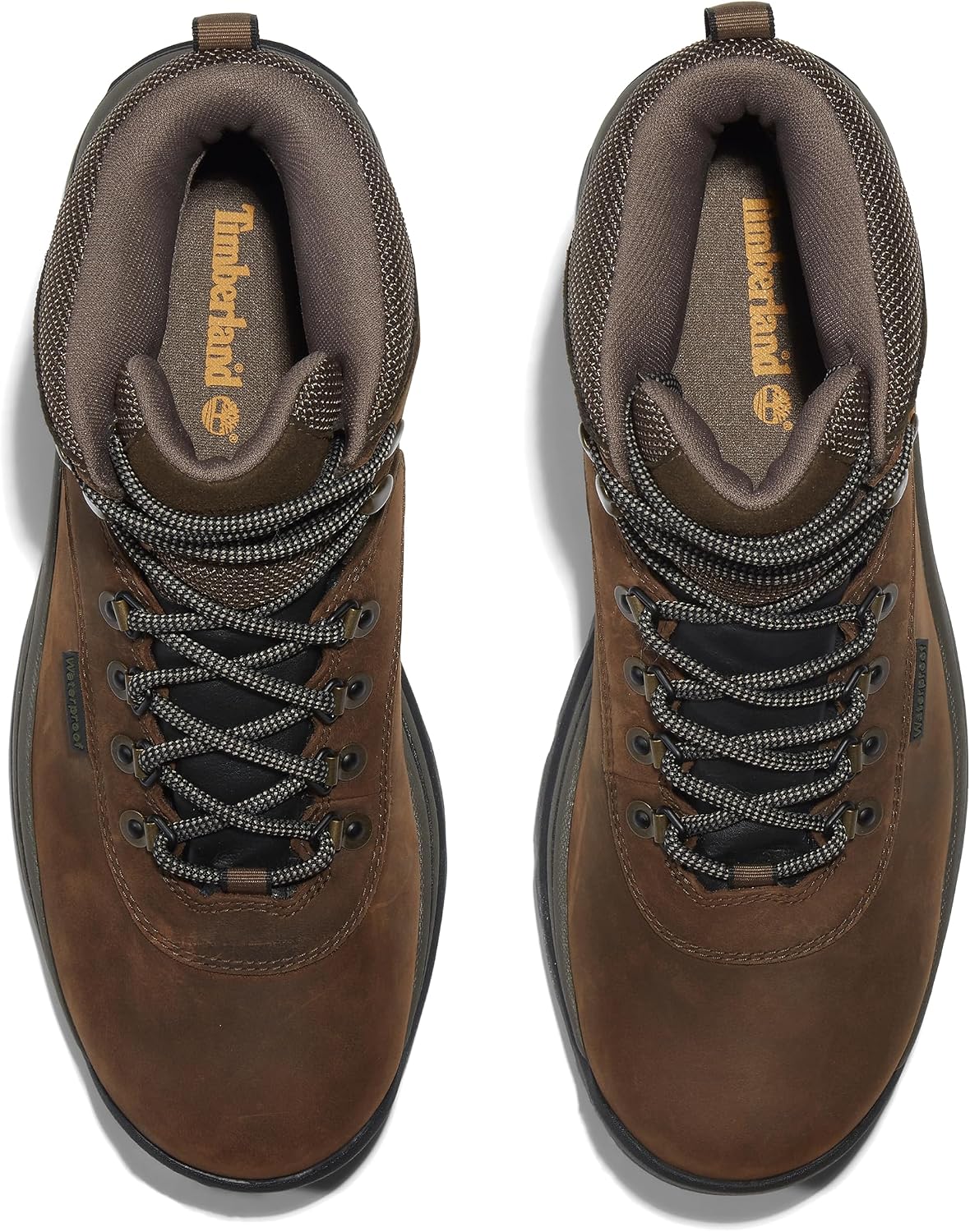 Waterproof leather hiking boots with gusseted tongue, rustproof hardware, and cushioned EVA midsole for all-terrain support and comfort.