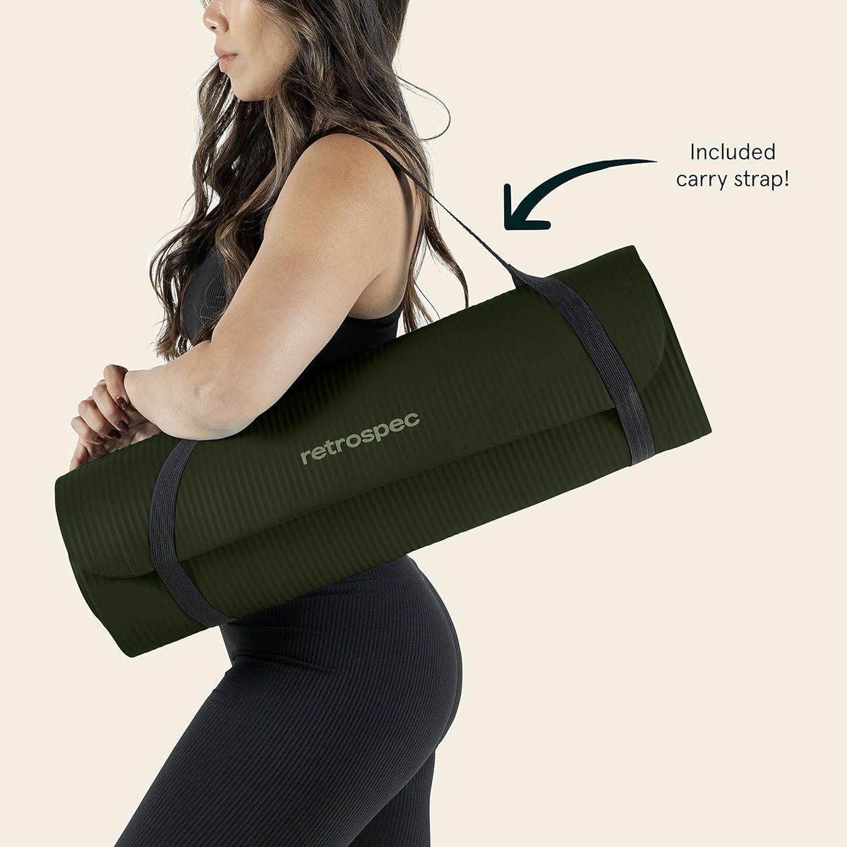 Retrospec Solana Spruce yoga mat carried using the included strap
