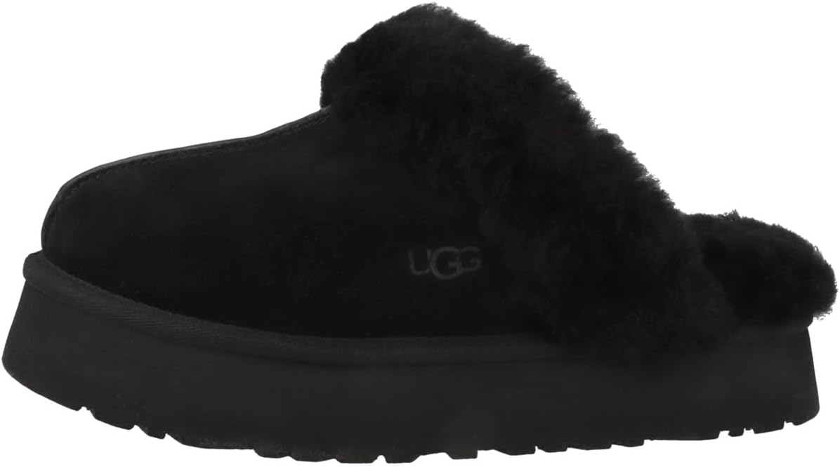 Elevate your loungewear with these UGG slippers featuring a platform sole, plush sheepskin lining, and a unique retro-style design.