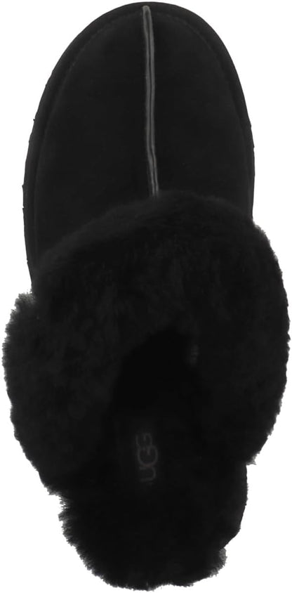 Elevate your loungewear with these UGG slippers featuring a platform sole, plush sheepskin lining, and a unique retro-style design.