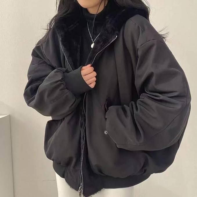 This reversible Sumleno sherpa jacket is a must-have for the chilly season. Soft, fuzzy, and warm, it's perfect for layering over any outfit.