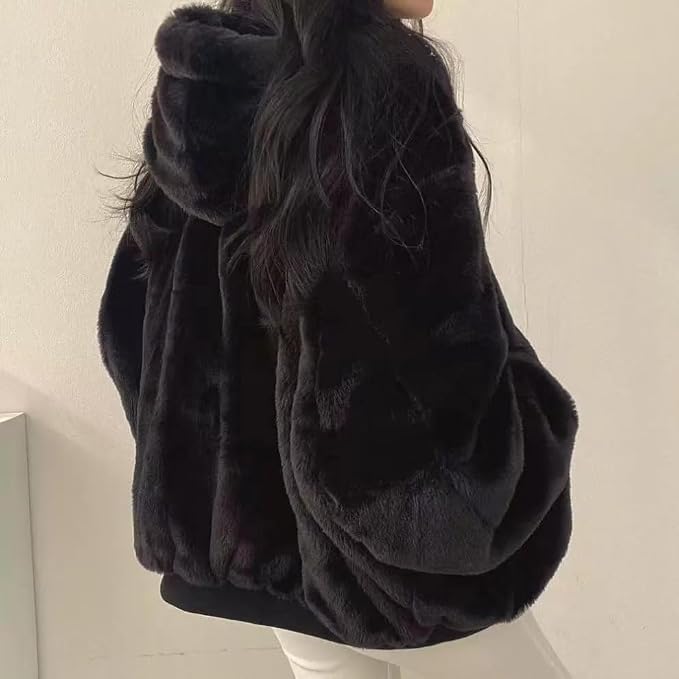 This reversible Sumleno sherpa jacket is a must-have for the chilly season. Soft, fuzzy, and warm, it's perfect for layering over any outfit.