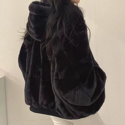 This reversible Sumleno sherpa jacket is a must-have for the chilly season. Soft, fuzzy, and warm, it's perfect for layering over any outfit.