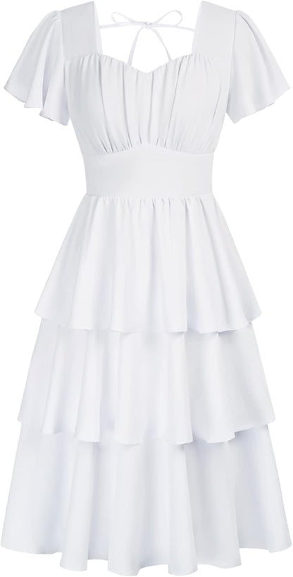 This soft, breathable dress features a flattering square neckline, smocked waist, and tiered ruffles for a feminine, vintage-inspired look