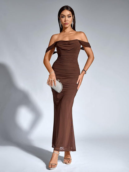Stunning off-the-shoulder dress with ruched detailing and slim bodycon fit for weddings, parties, or nights out.