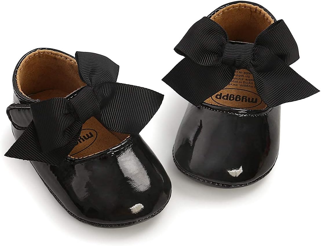 These adorable baby girl shoes are super soft and comfortable, with an adjustable closure to stay on little feet. Perfect for any occasion.
