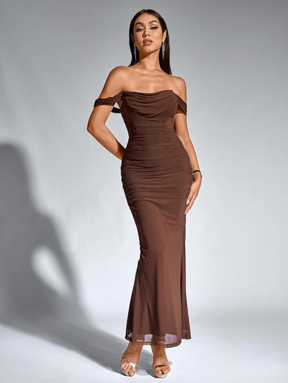 Stunning off-the-shoulder dress with ruched detailing and slim bodycon fit for weddings, parties, or nights out.
