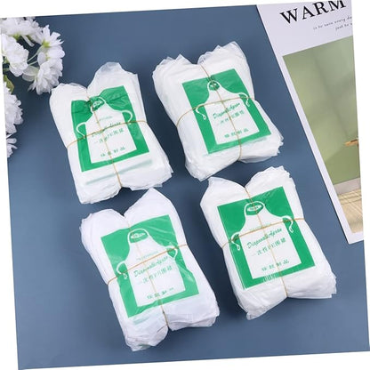 HOMSFOU 100pcs Disposable Plastic Apron for Kids Cooking Apron Waterproof Toddler Paint Smock Easy to Clean