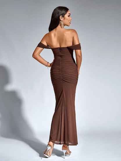 Stunning off-the-shoulder dress with ruched detailing and slim bodycon fit for weddings, parties, or nights out.