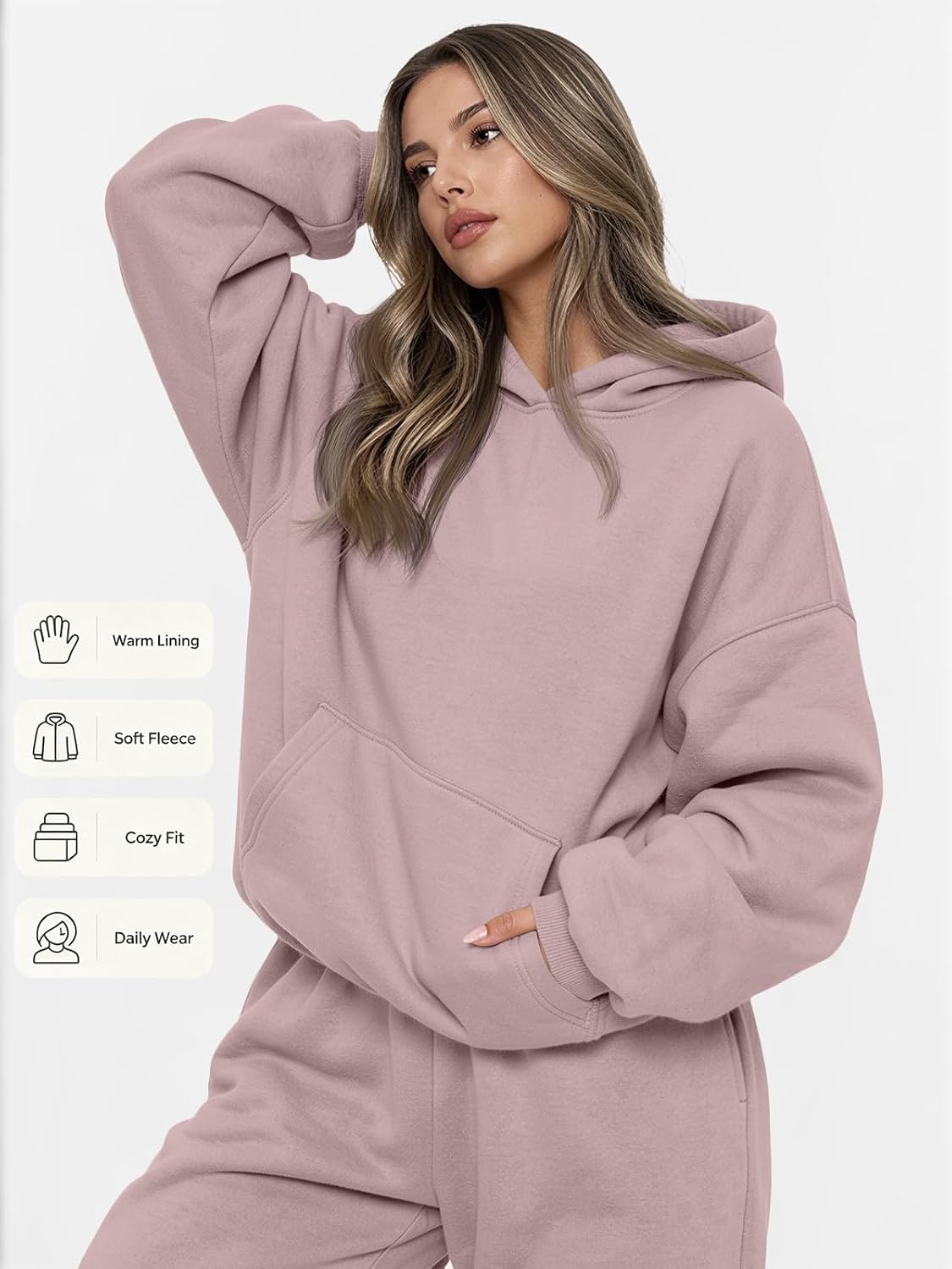 This cozy 2-piece tracksuit set offers an oversized, relaxed fit with a soft, warm fabric blend. Perfect for casual lounging or everyday wear.