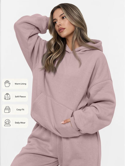 This cozy 2-piece tracksuit set offers an oversized, relaxed fit with a soft, warm fabric blend. Perfect for casual lounging or everyday wear.