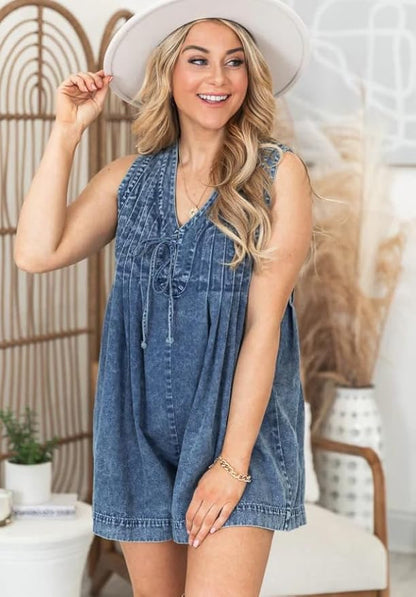 This versatile denim romper features a sleeveless v-neck design, wide legs, and double hand pockets for a casual yet stylish look.