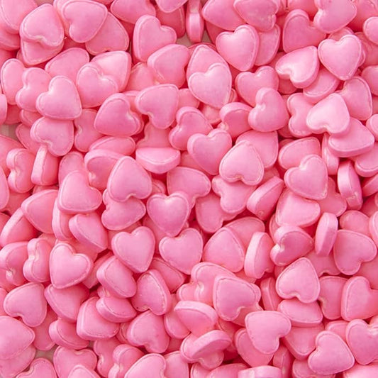 Pink heart-shaped granules