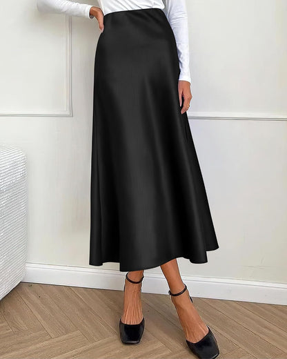 High-quality satin midi skirt from BTFBM, flowy A-line silhouette, elegant design, perfect for any special occasion.