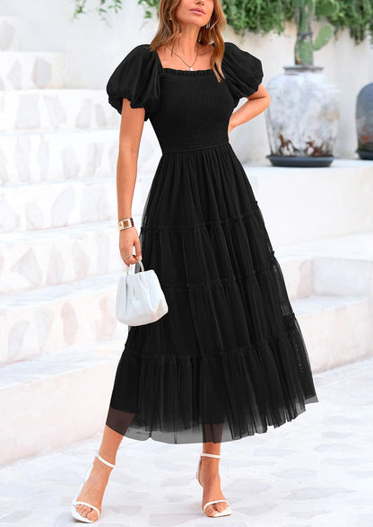 Midi dress with smocked bodice, puffy sleeves, and ruffled tulle skirt for weddings, parties, or casual wear.
