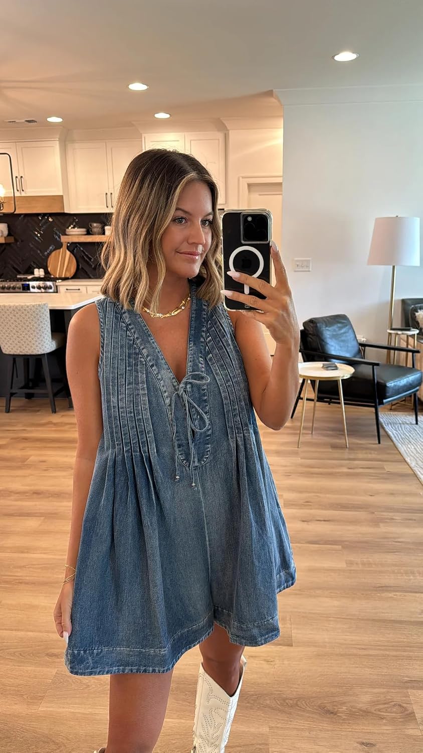 This versatile denim romper features a sleeveless v-neck design, wide legs, and double hand pockets for a casual yet stylish look.