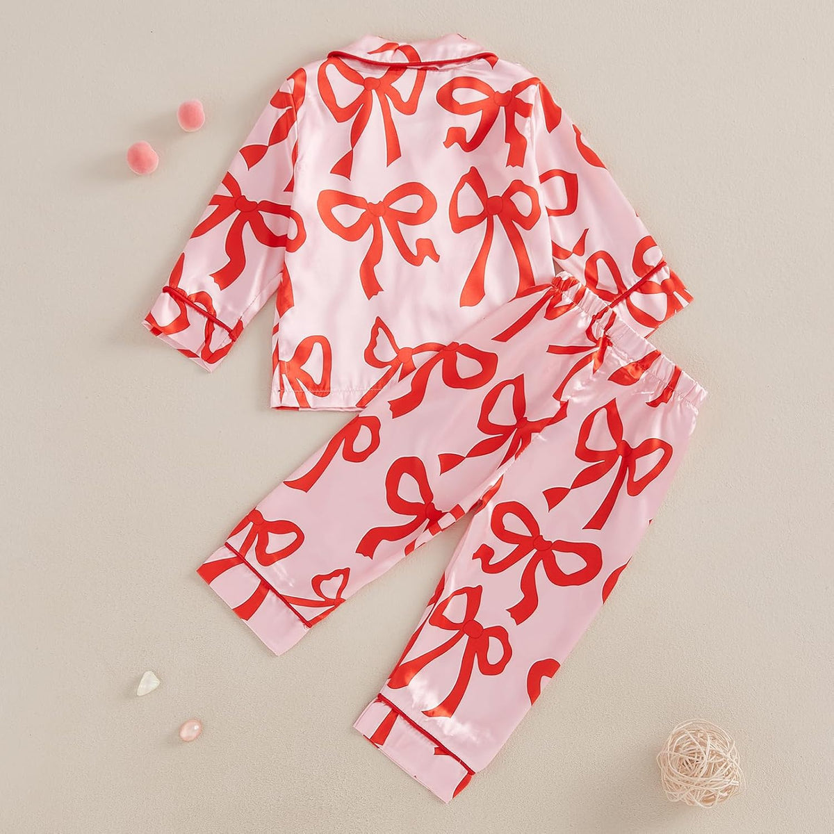 High-quality satin pajama set with Santa Claus and holiday print, soft, breathable fabric, and comfortable fit for cozy winter nights.