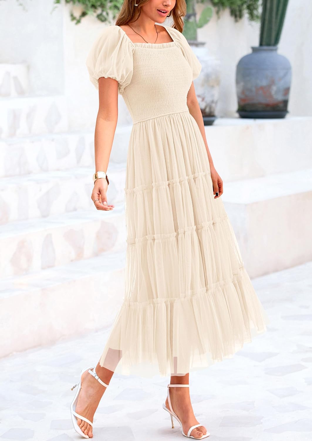 Flattering square neckline, puffed sleeves, smocked bodice, lightweight tulle fabric, beautiful feminine look, cool and comfortable.