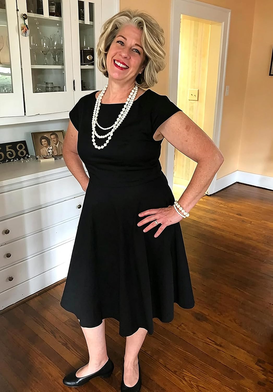 1950s-inspired cocktail dress, flattering boatneck, cap sleeves, pockets, stylish and practical. Check it out on - you won't regret it!