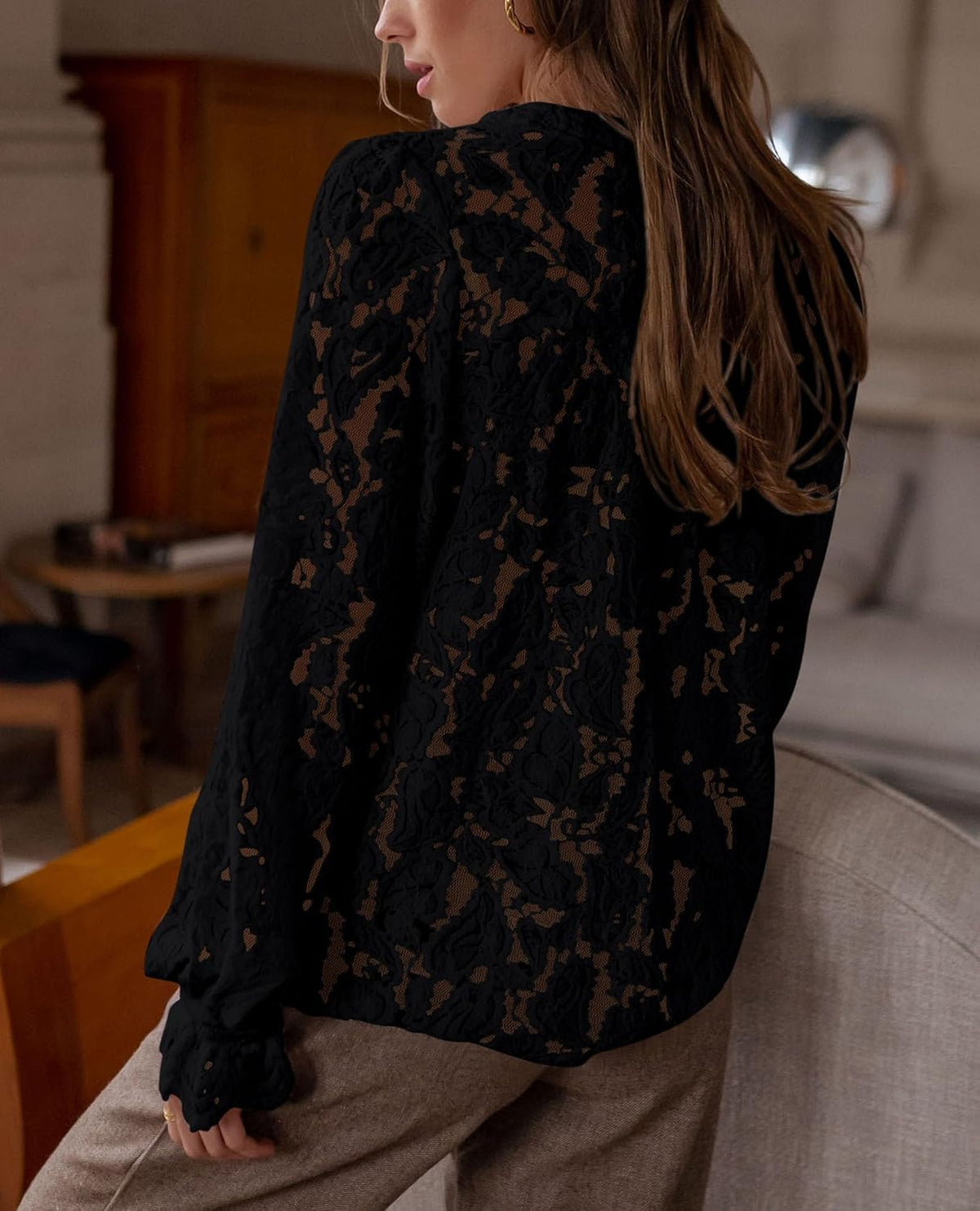 Soft, lace-trimmed blouse perfect for dressy casual looks - pairs easily with various bottoms for all-day comfort and style.