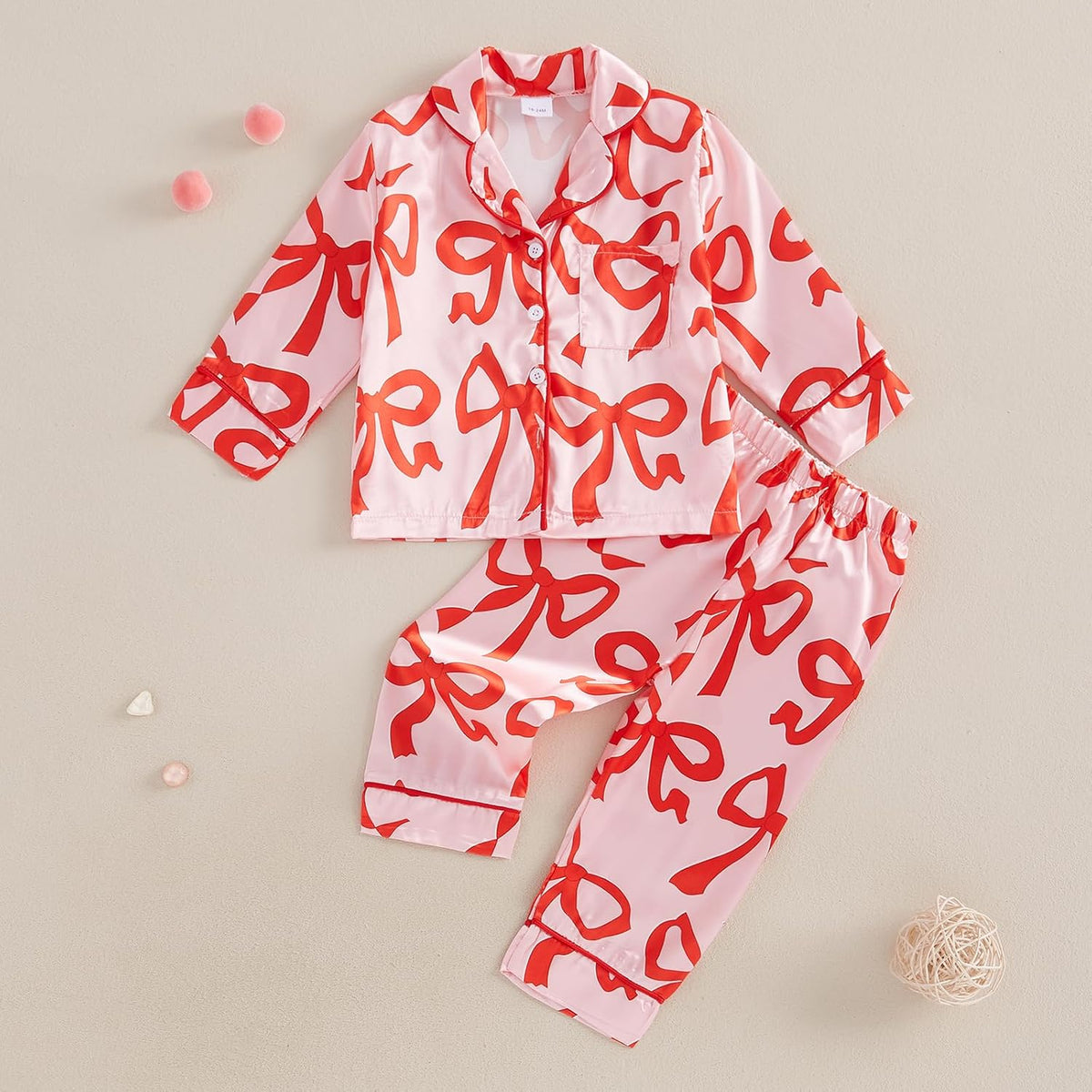 High-quality satin pajama set with Santa Claus and holiday print, soft, breathable fabric, and comfortable fit for cozy winter nights.