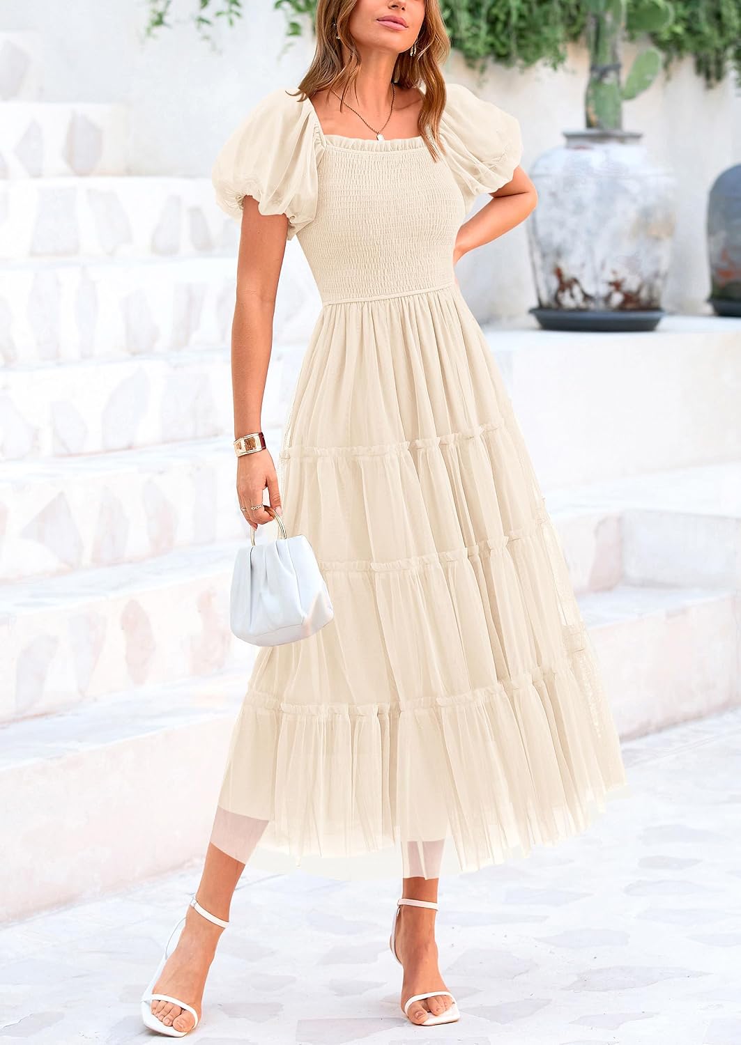 Flattering square neckline, puffed sleeves, smocked bodice, lightweight tulle fabric, beautiful feminine look, cool and comfortable.