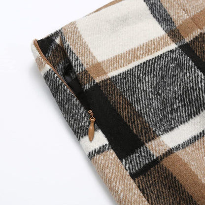 This soft, warm plaid wool blend dress is perfect for fall and winter. The high-waisted, above-the-knee style is versatile for any occasion.