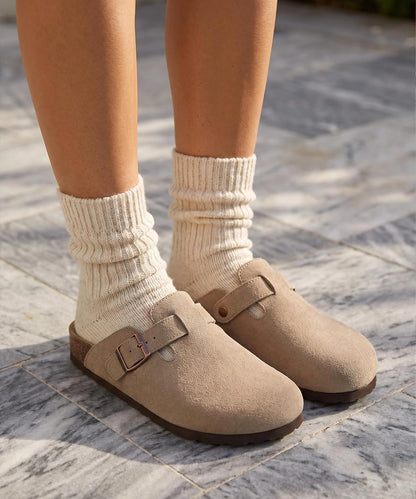 Genuine suede clogs with cork footbed, arch support, adjustable straps, and non-slip sole for comfortable all-day wear.