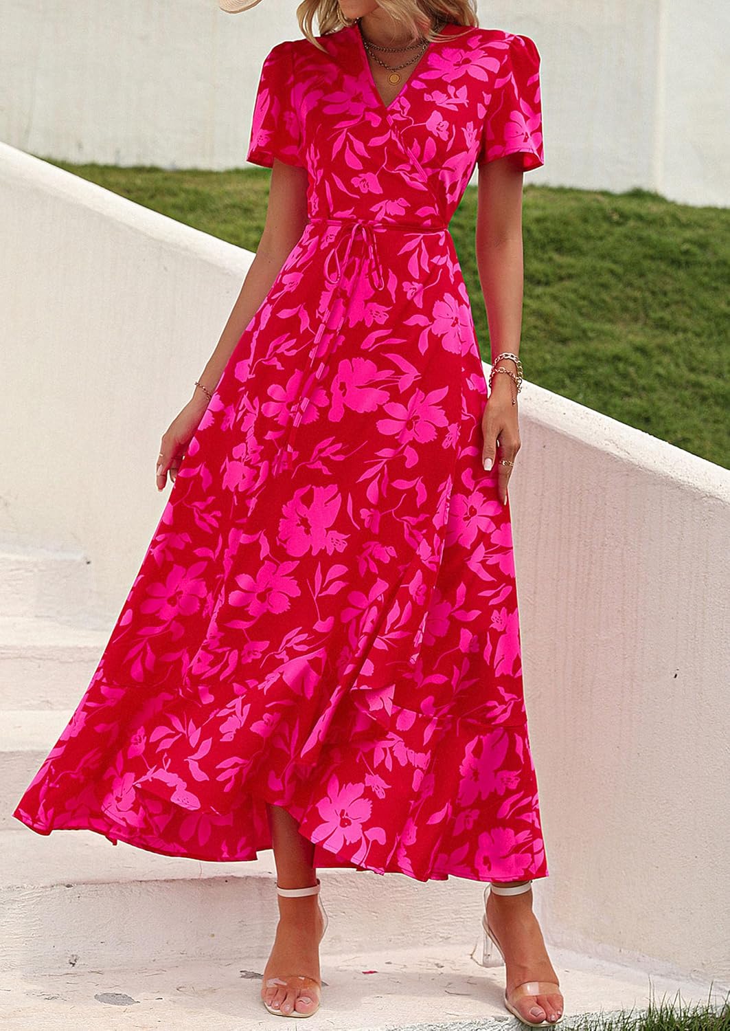 This flowy, floral maxi dress features a flattering wrap design, ruffle hem, and high split - perfect for effortless summer style.