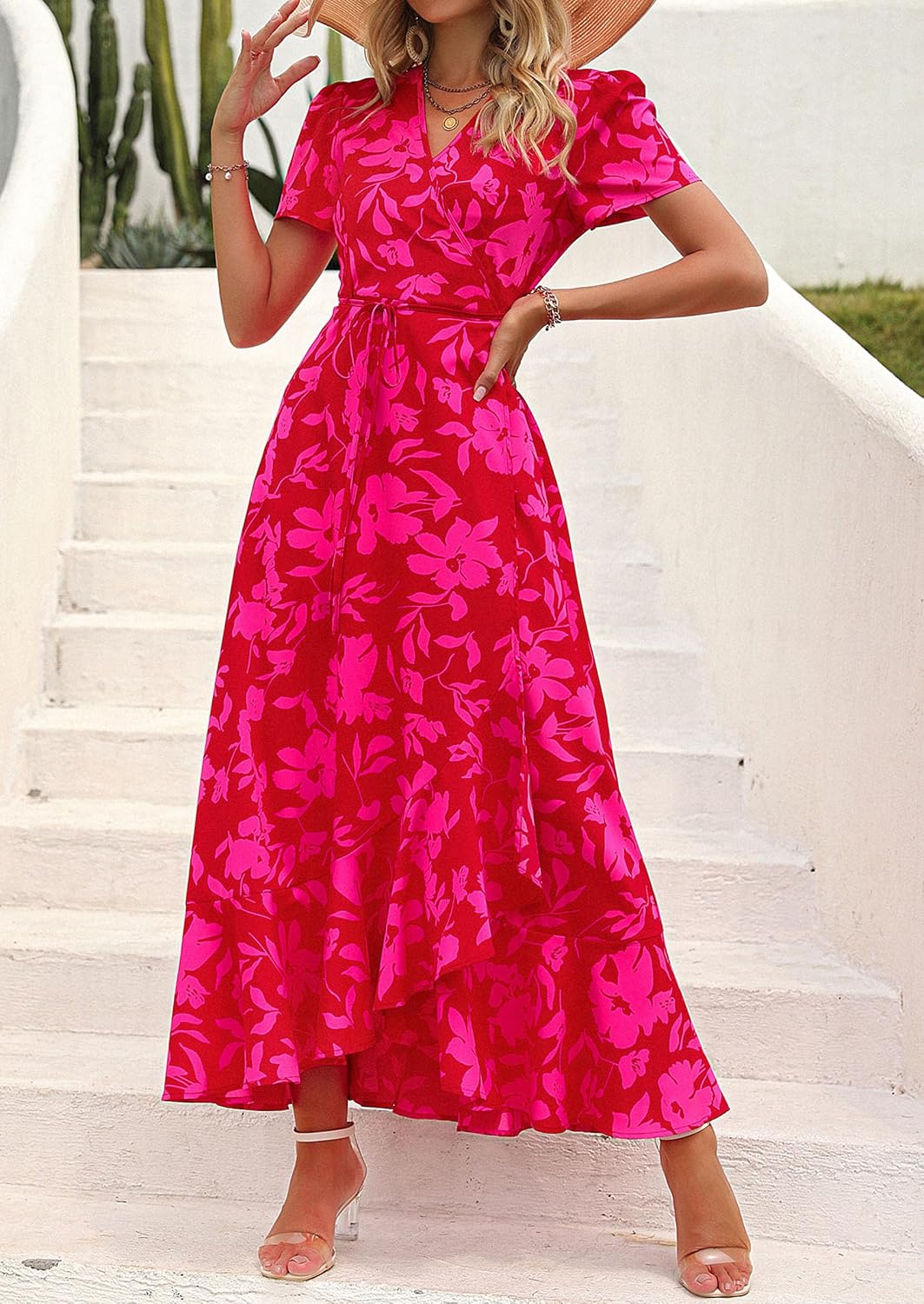 This flowy, floral maxi dress features a flattering wrap design, ruffle hem, and high split - perfect for effortless summer style.