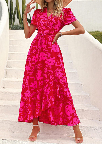 This flowy, floral maxi dress features a flattering wrap design, ruffle hem, and high split - perfect for effortless summer style.