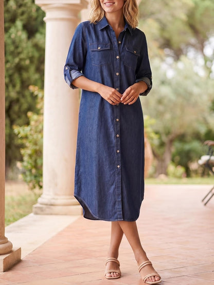 Kuraki denim maxi dress with button-front, slim fit, soft fabric, versatile style, wardrobe essential.