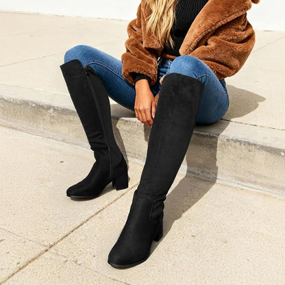 Soft suede upper, faux fur lining, zipper closure for classic, fashionable, warm, and comfortable knee-high boots.