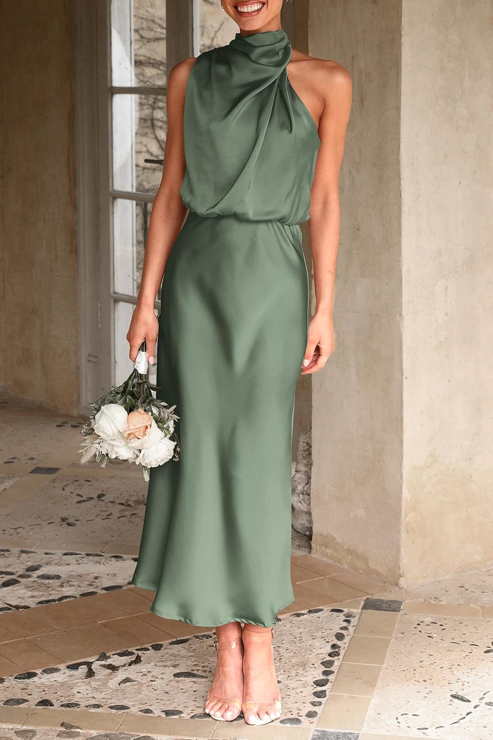 This sleeveless maxi dress features a mock neck design and an elegant satin material that's perfect for summer events and parties.