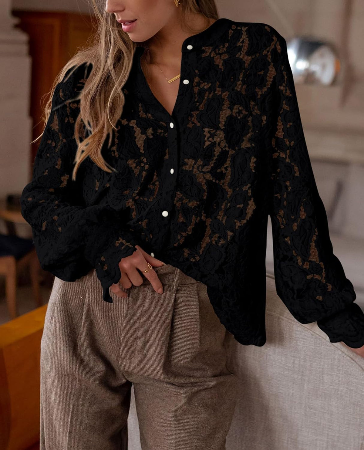 Soft, lace-trimmed blouse perfect for dressy casual looks - pairs easily with various bottoms for all-day comfort and style.