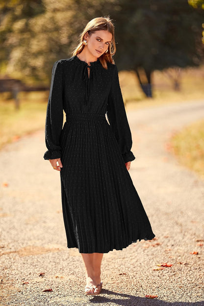 This PRETTYGARDEN midi dress features a flattering A-line silhouette, pleated details, and a soft, lightweight fabric for all-day comfort.