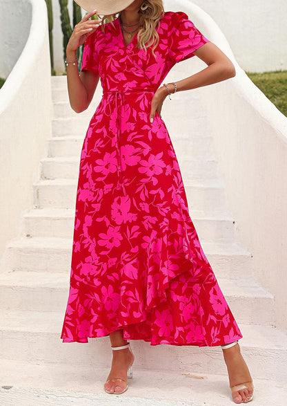 This flowy, floral maxi dress features a flattering wrap design, ruffle hem, and high split - perfect for effortless summer style.