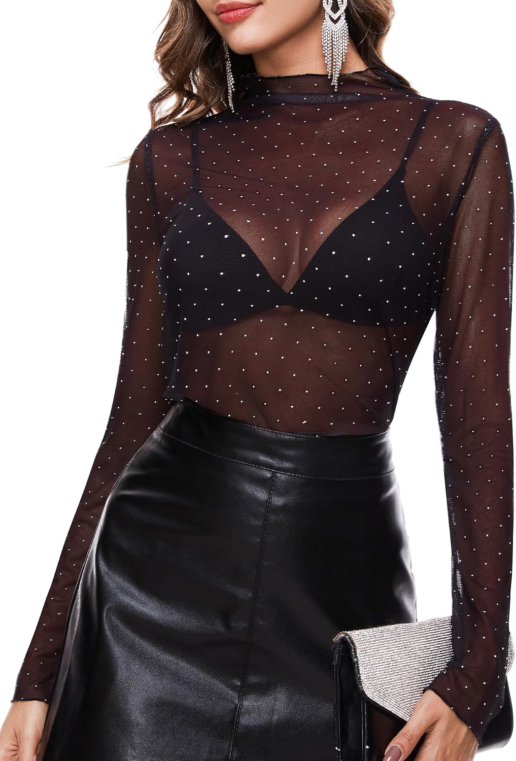 This soft, lightweight mesh top adds a chic, sparkly layer to any outfit. The mock neck and ruffled details create an elegant, eye-catching look.