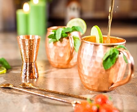 Copper jigger lacquered for the shine and to prevent tarnish. - Double 1oz2oz copper measuring jigger for cocktail mixing. - Solid hammered copper 22G copper. - Copper shot glass for Moscow mule.