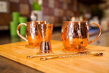 Copper jigger lacquered for the shine and to prevent tarnish. - Double 1oz2oz copper measuring jigger for cocktail mixing. - Solid hammered copper 22G copper. - Copper shot glass for Moscow mule.