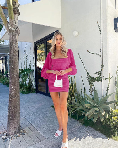 Stylish Wenrine dress with square neck, mesh sleeves, ruched detailing, and bodycon fit for a sleek, sophisticated look.