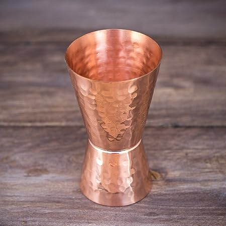 Copper jigger lacquered for the shine and to prevent tarnish. - Double 1oz2oz copper measuring jigger for cocktail mixing. - Solid hammered copper 22G copper. - Copper shot glass for Moscow mule.