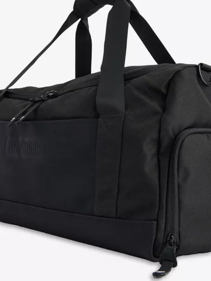 Gymshark - Twin top-handles, adjustable and detachable strap, contrast slip pocket and embossed branding at front, contrast mesh pocket at side, zipped pocket at side, branded at base, one main compartment, interior zipped pocket, lined (Black)
