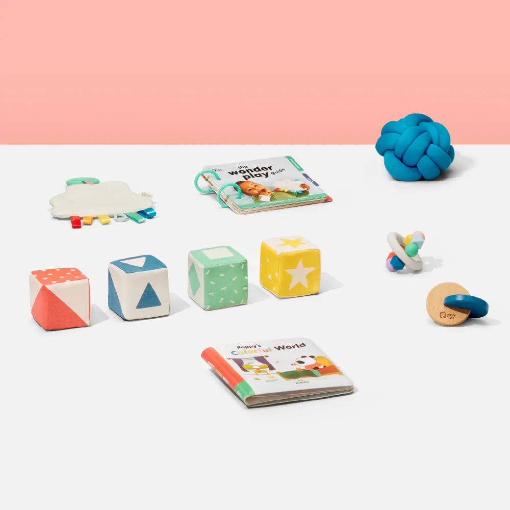KiwiCo Let's Discover! Explore tactile play with your baby and help them develop fine motor skills. ( 4-5 Months )