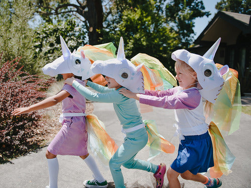 Glowing horn unicorn, A unicorn costume with a light-up horn and a matching tail.
